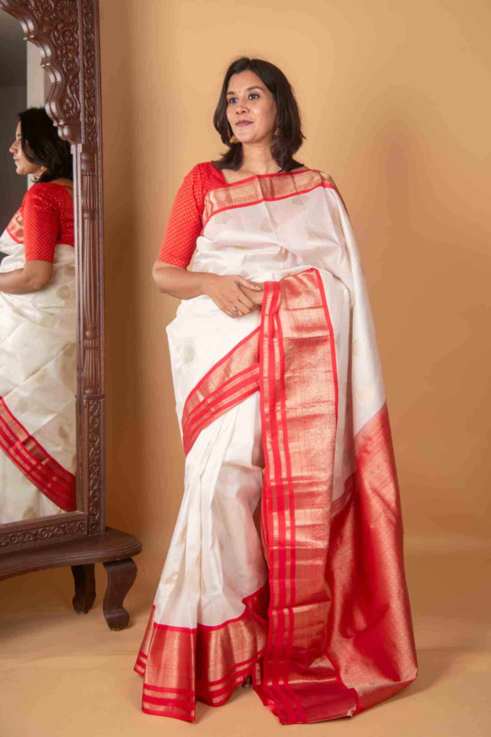 White Kanjivaram with Gold Buttas