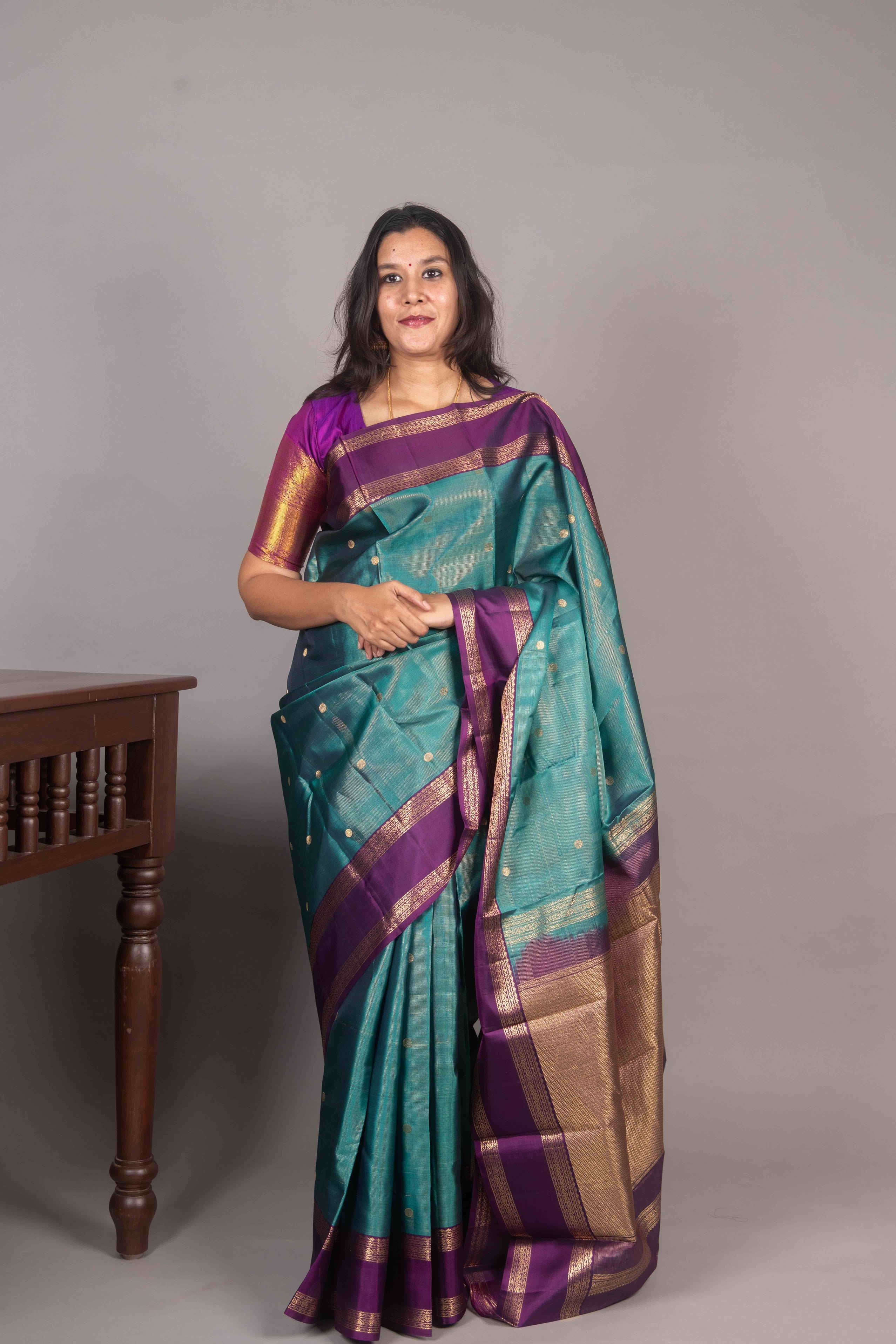 Peacock Blue Kanjivaram with Retta Pettu Border