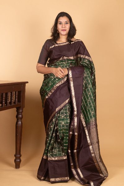 Dark Green Kanjivaram with Retta Pettu Border