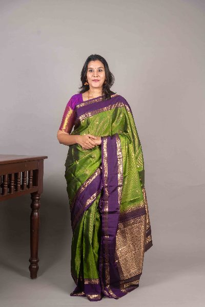 Leaf Green Silk Saree with Retta Pettu Border