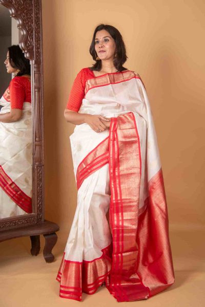 White Kanjivaram with Gold Buttas